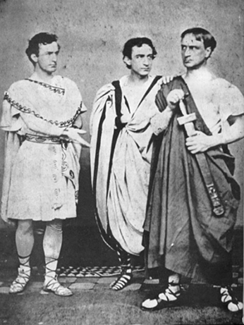 Boot_Caesar.jpg Black-and-white portrait from 1864 of the booth brothers in ancient Roman costum, with John Wilkes Booth's Marc ANtory holding his hand out toward Junius Brutus Booth Jr.'s Cassius, who has his hand on his sword hilt