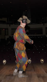 Steven Epp in patchwork costume and mask in "The Servant of Two Masters"